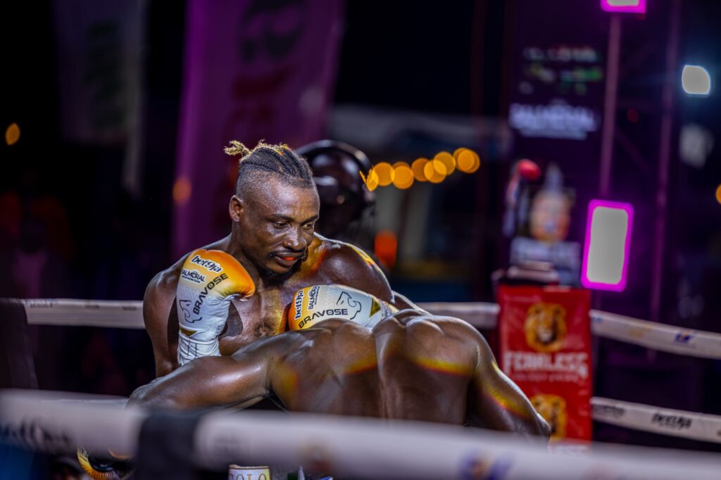 Zodsolo with his guard up against the ropes during the fight at Chaos in the Ring, Lagos.